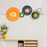 Wide room view of ORANGEPVD wall art as a central piece in a contemporary interior